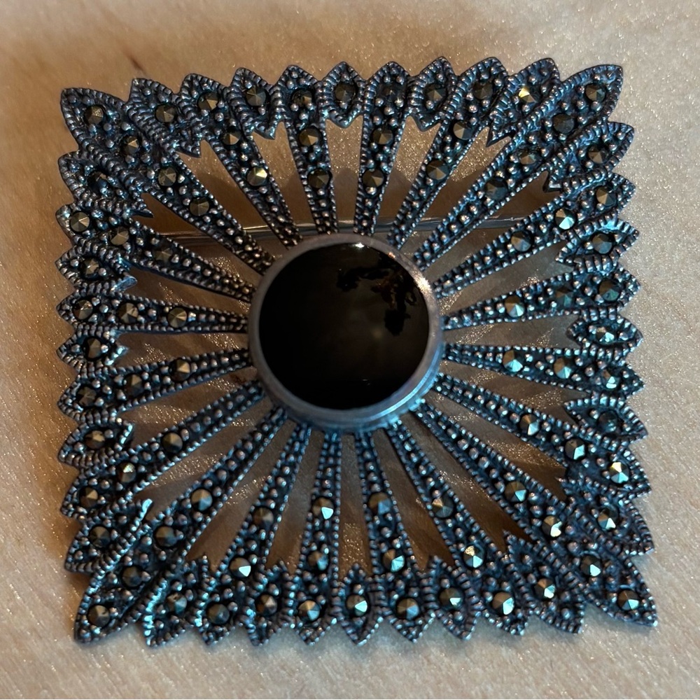 Marcasite and black onyx sterling silver brooch